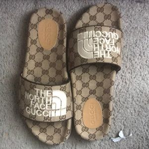 Gucci x North Face. Size 10 slides. Unworn. In box with dustbag.